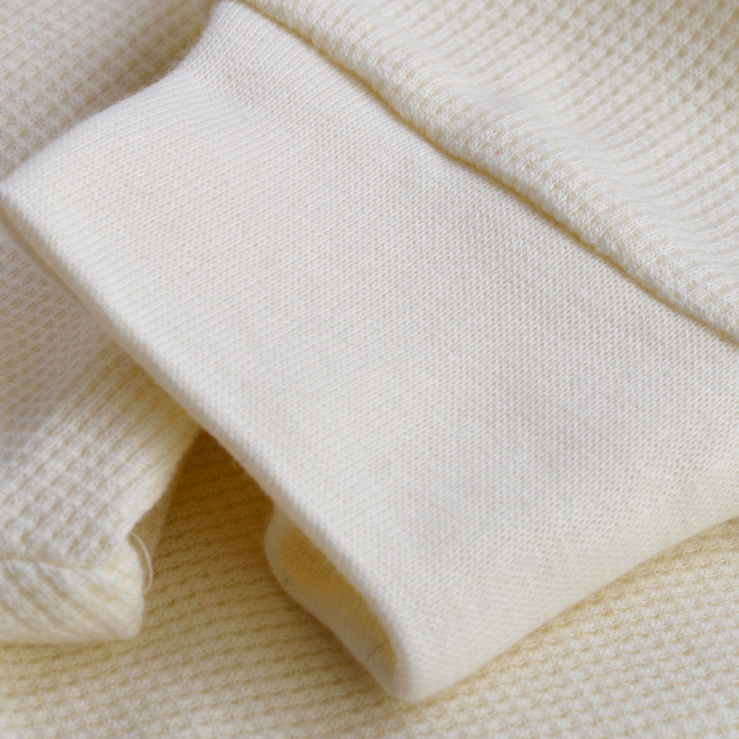 Versatile neutral shade pairs easily with layers.
