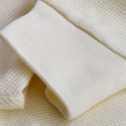 Versatile neutral shade pairs easily with layers.