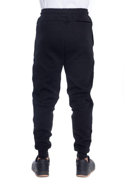 Back view of men�fs black jogger sweatpants with elastic waistband, slim tapered fit, and single back pocket