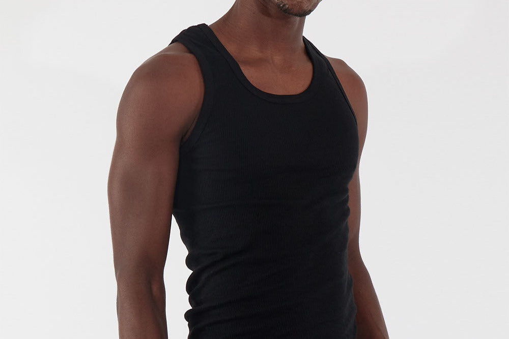 Rich Cotton black ribbed tank, minimalist design with classic athletic style.